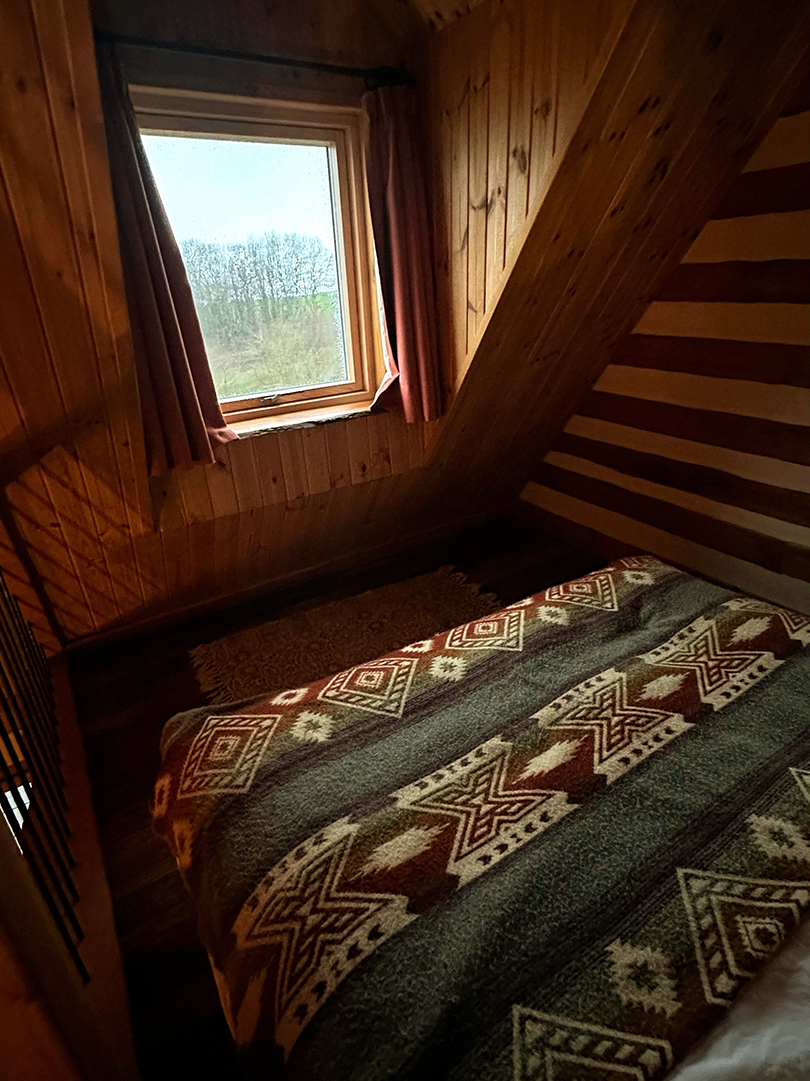 Loft bedroom at Mount Freedom Cabins, Ayrshire