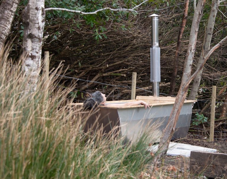 Wood fired outdoor bath at Backtack Bothies, Glenfinnan