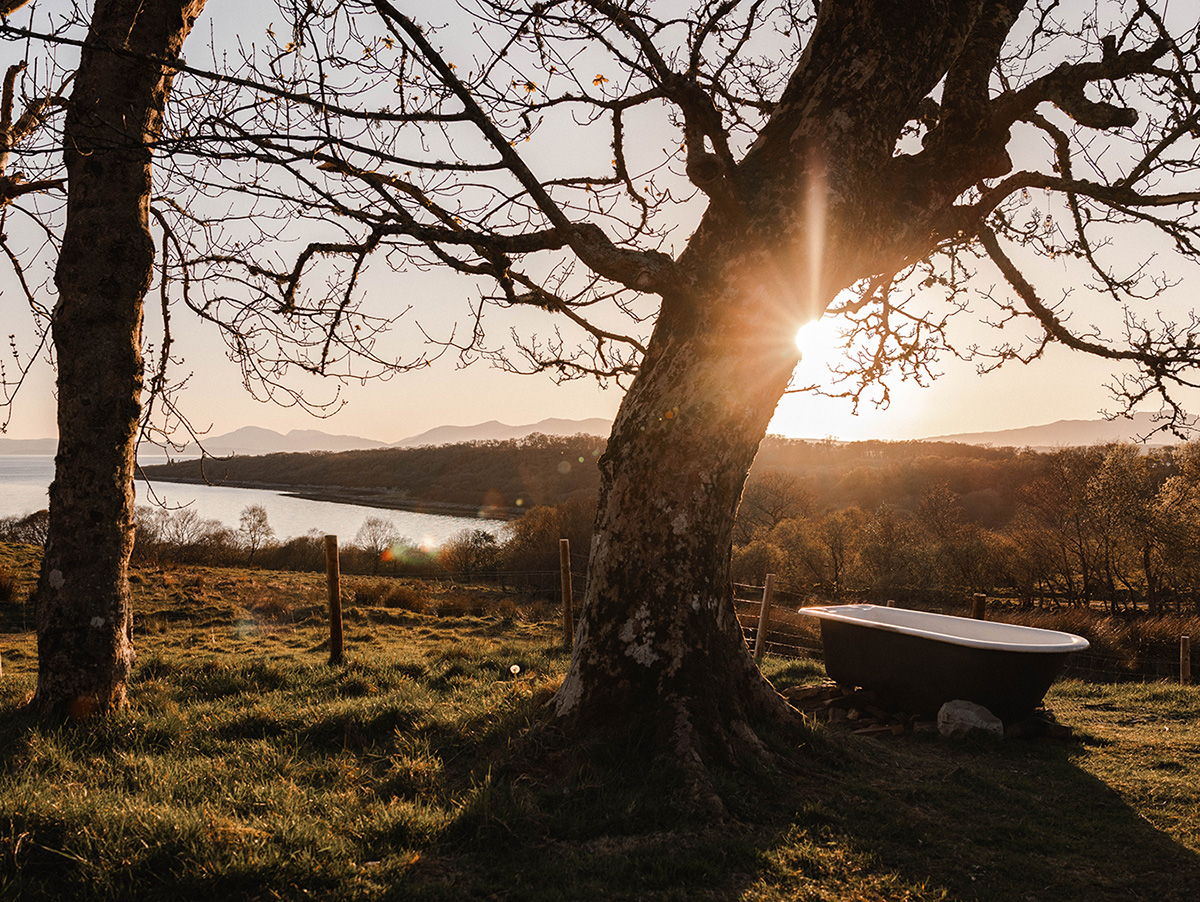 An outdoor bath in Scotland over looking the mountains