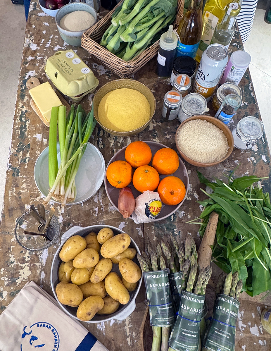 Fresh ingredients on a rustic table at a cooking class in Scotland