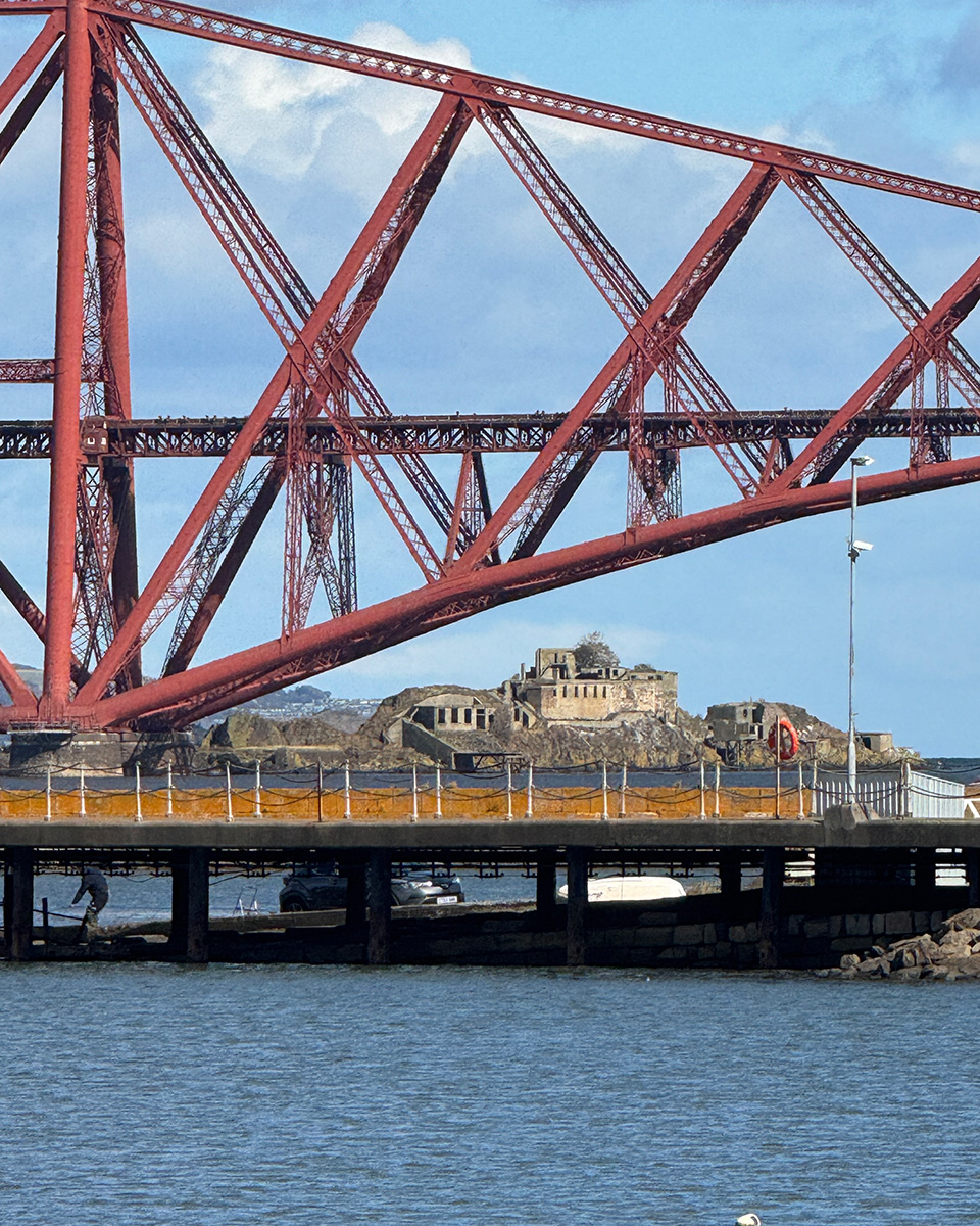 The Forth Bridge and Island on the Firth of Forth.