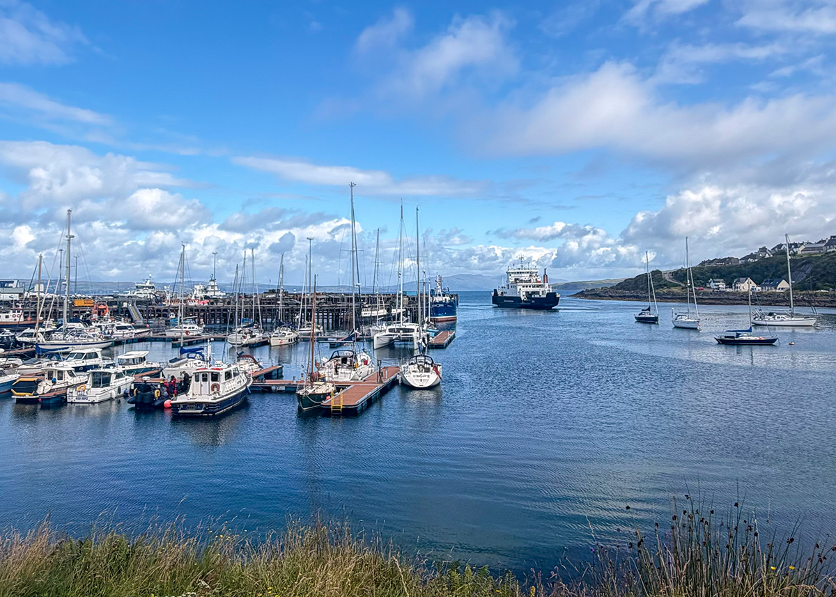 Mallaig Harbour with the ferry leaving for Skye.